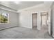Spacious bedroom with carpet flooring and window at 3207 Stratton Cir, Kissimmee, FL 34744