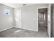Bright bedroom with neutral walls and carpet at 3207 Stratton Cir, Kissimmee, FL 34744