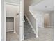 Bright entryway with staircase and coat rack at 3207 Stratton Cir, Kissimmee, FL 34744