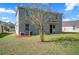 Two-story house with backyard and landscaping at 3207 Stratton Cir, Kissimmee, FL 34744