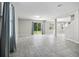Spacious living room with tile floors and access to backyard at 3207 Stratton Cir, Kissimmee, FL 34744