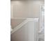 Upstairs hall with carpet and white trim at 3207 Stratton Cir, Kissimmee, FL 34744