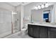 Clean bathroom with single vanity, shower, and toilet at 7457 Marker Ave, Kissimmee, FL 34747