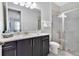 Bathroom with single vanity and large walk-in shower at 7457 Marker Ave, Kissimmee, FL 34747