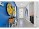 Bright entryway with glass front door and decorative wall art at 7457 Marker Ave, Kissimmee, FL 34747