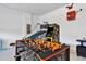 Foosball table and arcade game in game room at 7457 Marker Ave, Kissimmee, FL 34747