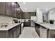 Modern kitchen with stainless steel appliances and quartz countertops at 7457 Marker Ave, Kissimmee, FL 34747