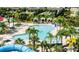 Resort-style pool with a waterslide and lounge chairs at 7457 Marker Ave, Kissimmee, FL 34747