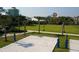 Beach volleyball court with a water park in the background at 7457 Marker Ave, Kissimmee, FL 34747
