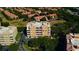 Luxury condo building with terracotta roof and multiple balconies at 7500 Toscana Blvd # 341, Orlando, FL 32819