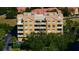 Three-story building with multiple balconies and terracotta roof tiles at 7500 Toscana Blvd # 341, Orlando, FL 32819