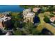 Luxury condo building near lake with lush green surroundings at 7500 Toscana Blvd # 341, Orlando, FL 32819