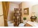 Clean bathroom with a tub and shower, and updated fixtures at 7500 Toscana Blvd # 341, Orlando, FL 32819