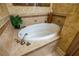 Relaxing bathroom featuring an oval soaking tub at 7500 Toscana Blvd # 341, Orlando, FL 32819