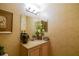 Elegant bathroom with light beige walls and modern vanity at 7500 Toscana Blvd # 341, Orlando, FL 32819