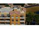 Three-story building with multiple balconies and terracotta roof tiles at 7500 Toscana Blvd # 341, Orlando, FL 32819