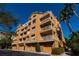 Building exterior showcasing multiple balconies and garage access at 7500 Toscana Blvd # 341, Orlando, FL 32819