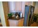 Kitchen corner with granite countertop, stainless steel appliances, and light wood cabinets at 7500 Toscana Blvd # 341, Orlando, FL 32819