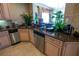 Kitchen with granite countertops and a corner sink at 7500 Toscana Blvd # 341, Orlando, FL 32819