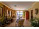 Spacious living room with neutral-toned furniture and access to a balcony at 7500 Toscana Blvd # 341, Orlando, FL 32819