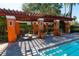 Relaxing pool area with pergola and comfortable seating at 7500 Toscana Blvd # 341, Orlando, FL 32819