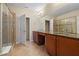 Elegant bathroom with double vanity and walk-in shower at 8345 Bella Tierra Ct # 8345, Davenport, FL 33896