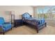 Spacious bedroom with ample natural light and window coverings at 8345 Bella Tierra Ct # 8345, Davenport, FL 33896
