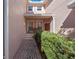 Brick walkway leads to front entrance with lush landscaping at 8345 Bella Tierra Ct # 8345, Davenport, FL 33896