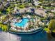 Community pool with expansive sundeck and spa at 8345 Bella Tierra Ct # 8345, Davenport, FL 33896