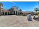 Elegant clubhouse with fountain and spacious entryway at 8943 Cabot Cliffs Dr, Davenport, FL 33896