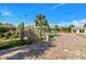 Relaxing pool area with a wooden bridge and lounge chairs at 8943 Cabot Cliffs Dr, Davenport, FL 33896