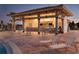 Outdoor pool bar and lounge area with comfortable seating at 8943 Cabot Cliffs Dr, Davenport, FL 33896