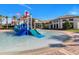 Fun splash pad for with water features and a small slide at 8943 Cabot Cliffs Dr, Davenport, FL 33896