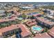 Community overview with multiple buildings and pools at 904 Charo Pkwy # 525, Davenport, FL 33897