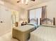 Bedroom with two twin beds and access to a full bathroom at 904 Charo Pkwy # 525, Davenport, FL 33897