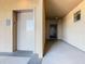 Building entry with elevator and private condo access at 904 Charo Pkwy # 525, Davenport, FL 33897