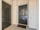 Private condo entrance with storage and access to elevator at 904 Charo Pkwy # 525, Davenport, FL 33897