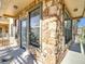Private balcony with stone accents and iron railings at 904 Charo Pkwy # 525, Davenport, FL 33897