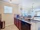 Modern kitchen with stainless steel appliances and granite countertops at 904 Charo Pkwy # 525, Davenport, FL 33897