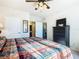 Comfortable main bedroom with king-size bed and private access to the bathroom at 904 Charo Pkwy # 525, Davenport, FL 33897