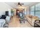 Open concept living space seamlessly combining living, dining, and kitchen areas at 904 Charo Pkwy # 525, Davenport, FL 33897