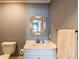 Simple bathroom with vanity and toilet at 12128 Sw 41St Pl, Ocala, FL 34481