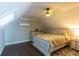 Cozy bedroom with hardwood floors and a ceiling fan at 12128 Sw 41St Pl, Ocala, FL 34481