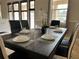 Dark wood dining table with six chairs at 12128 Sw 41St Pl, Ocala, FL 34481
