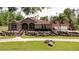 One-story home with stone accents and a large backyard at 12128 Sw 41St Pl, Ocala, FL 34481