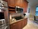 Kitchen with stainless steel appliances and granite countertops at 12128 Sw 41St Pl, Ocala, FL 34481