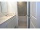 Double vanity bathroom with tub and toilet at 2306 Amorie Dr, Kissimmee, FL 34746