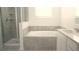 Bathroom with shower, soaking tub, and vanity at 2306 Amorie Dr, Kissimmee, FL 34746