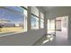 Bright breakfast nook with sliding glass door access to backyard at 2306 Amorie Dr, Kissimmee, FL 34746