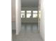 Bright and spacious hallway with tile flooring and lots of natural light at 2306 Amorie Dr, Kissimmee, FL 34746